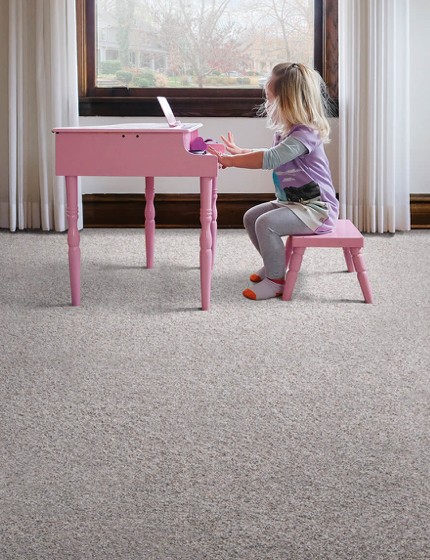 Girl with piano | The Carpet Stop