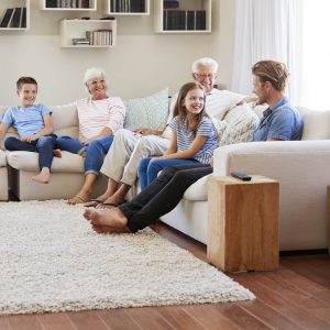 Family get together in living room | The Carpet Stop