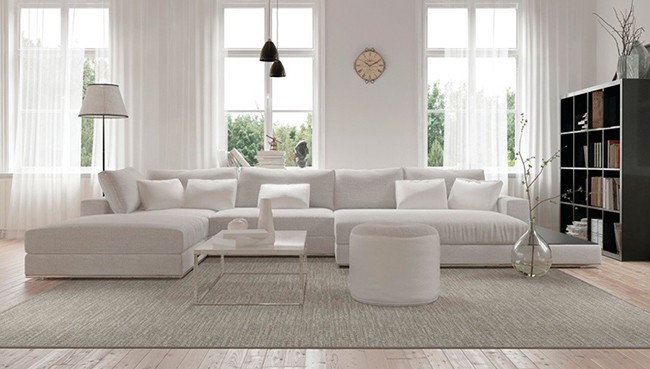 Living room carpet flooring with white sofa | The Carpet Stop