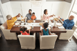 Family having breakfast at the dining table | The Carpet Stop